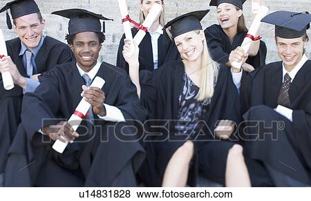 A group of graduates celebrating View Large Photo Image Stock Photo - A group of graduates celebrating. Fotosearch