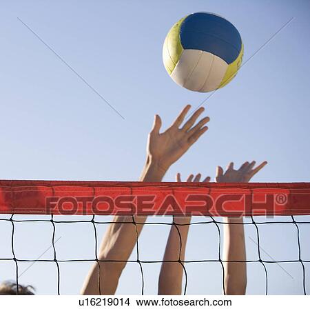 A game of beach volleyball View Large Photo Image Picture - A game of beach volleyball. Fotosearch