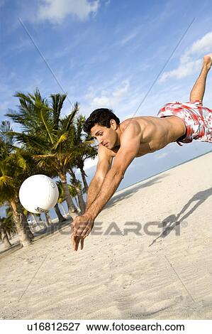 A man diving for the ball View Large Photo Image Stock Photo - A man diving for the ball. Fotosearch