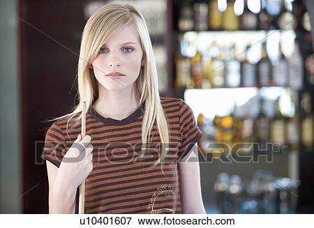 A teenage girl playing pool View Large Photo Image Stock Photo - A teenage girl playing pool. Fotosearch
