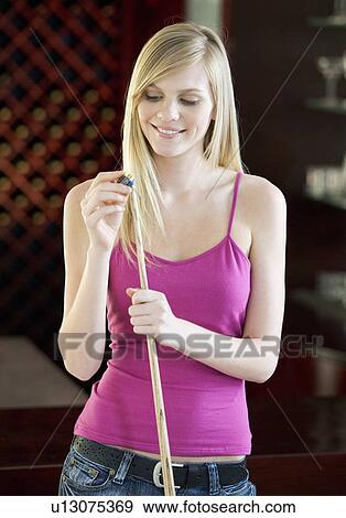 A teenage girl playing pool View Large Photo Image Stock Photo - A teenage girl playing pool. Fotosearch