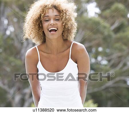 Portrait of a young woman View Large Photo Image Stock Image - Portrait of a young woman. Fotosearch