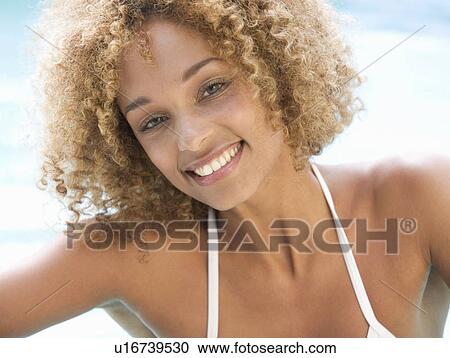 Portrait of a young woman View Large Photo Image Stock Image - Portrait of a young woman. Fotosearch
