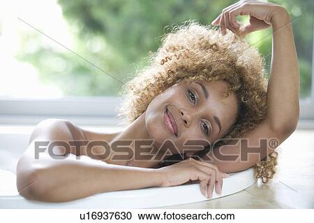 Stock Image - Portrait of a young woman. Fotosearch