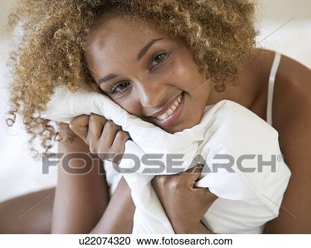 Stock Image - Portrait of a young woman. Fotosearch