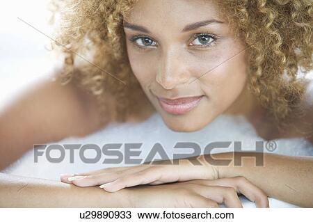 Portrait of a young woman View Large Photo Image Stock Image - Portrait of a young woman. Fotosearch