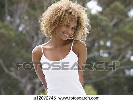 Portrait of a young woman View Large Photo Image Stock Photography - Portrait of a young woman. Fotosearch