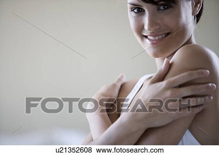 Portrait of a young woman View Large Photo Image Stock Photo - Portrait of a young woman. Fotosearch