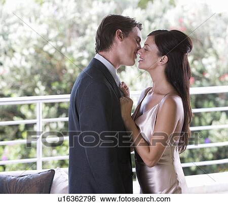 A couple dressed for an evening out View Large Photo Image Stock Photograph - A couple dressed for an evening out. Fotosearch