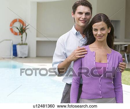 Portrait of a young couple View Large Photo Image Stock Image - Portrait of a young couple. Fotosearch