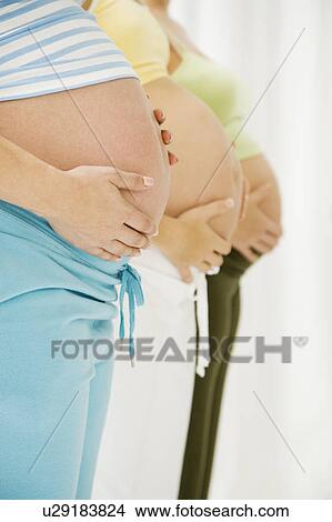 Picture - Three pregnant women. Fotosearch