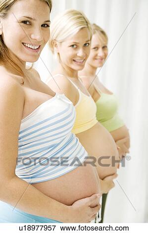 Stock Photo - Three pregnant women. Fotosearch