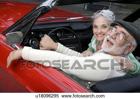 A senior couple in a sports car View Large Photo Image Stock Photography - A senior couple in a sports car. Fotosearch