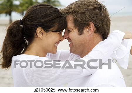 A couple on a beach View Large Photo Image Stock Photography - A couple on a beach. Fotosearch