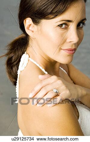 Picture - A woman on a beach. Fotosearch