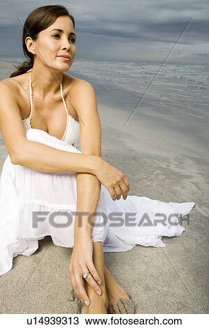 A woman on a beach View Large Photo Image Stock Image - A woman on a beach. Fotosearch