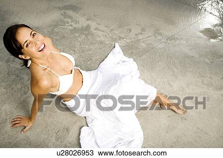 A woman on a beach View Large Photo Image Stock Image - A woman on a beach. Fotosearch