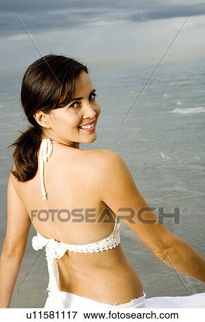 A woman on a beach View Large Photo Image Stock Photo - A woman on a beach. Fotosearch