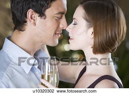 A couple drinking champagne View Large Photo Image Stock Image - A couple drinking champagne. Fotosearch