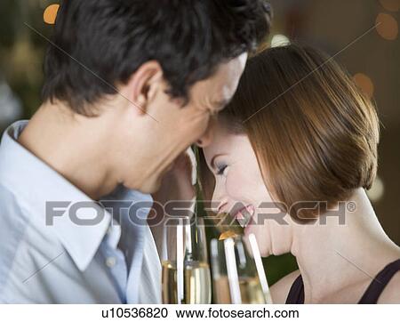 A couple drinking champagne View Large Photo Image Stock Image - A couple drinking champagne. Fotosearch