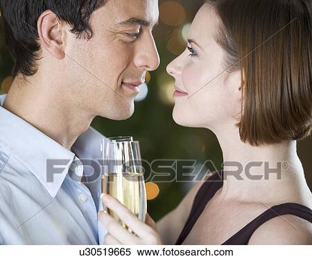 A couple drinking champagne View Large Photo Image Stock Photography - A couple drinking champagne. Fotosearch