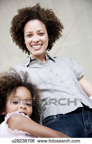 Stock Photograph - Mother and daughter. Fotosearch