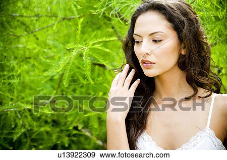 Beauty portrait of a woman in a tropical setting. View Large Photo Image Stock Photo - Beauty portrait of a woman in a tropical setting.. Fotosearch