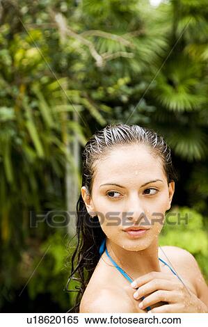 Beauty portrait of a woman in a tropical shower setting. View Large Photo Image Stock Photography - Beauty portrait of a woman in a tropical shower setting.. Fotosearch