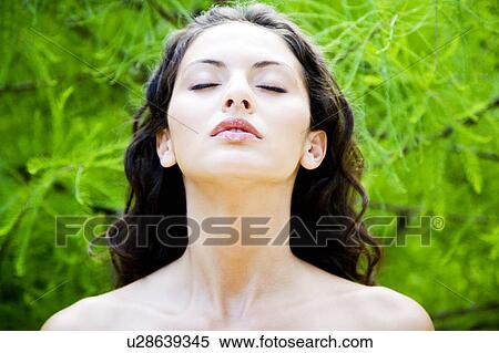 Beauty portrait of a woman in a tropical setting. View Large Photo Image Stock Photography - Beauty portrait of a woman in a tropical setting.. Fotosearch