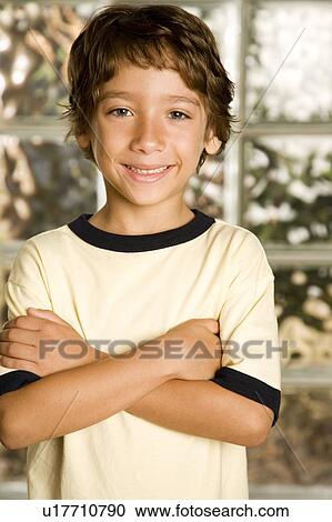 little boy smiling arms folded View Large Photo Image Stock Image - little boy smiling arms folded. Fotosearch