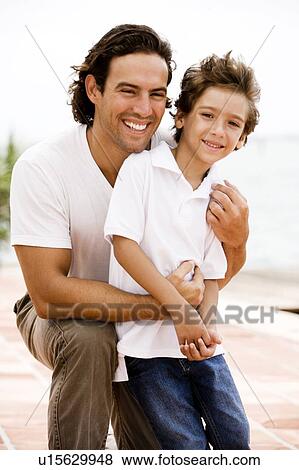 portrait of father and son outdoor View Large Photo Image Stock Photo - portrait of father and son outdoor. Fotosearch