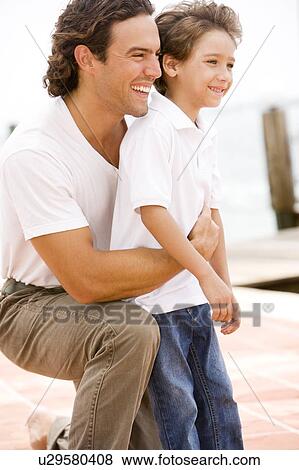 portrait of father and son outdoor View Large Photo Image Stock Photo - portrait of father and son outdoor. Fotosearch