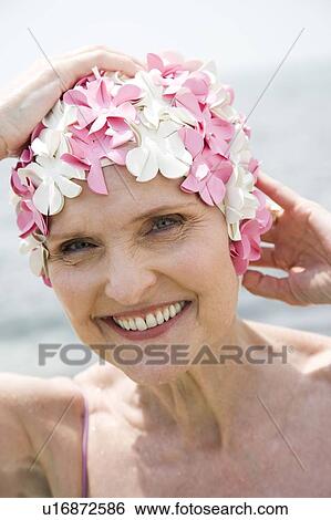 Stock Photograph - Senior woman in a swimming hat, . Fotosearch