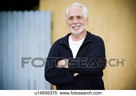 Portrait of a smiling senior man View Large Photo Image Stock Photography - Portrait of a smiling senior man . Fotosearch