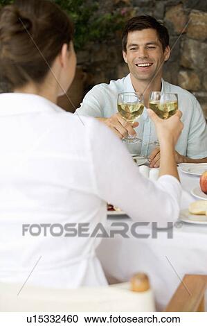 A couple sharing a romantic meal View Large Photo Image Stock Image - A couple sharing a romantic meal. Fotosearch