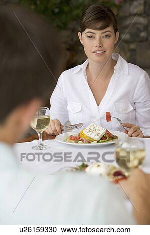 A couple sharing a romantic meal View Large Photo Image Stock Image - A couple sharing a romantic meal. Fotosearch