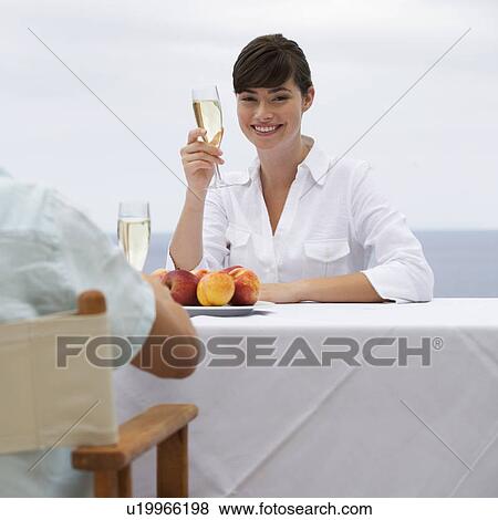 A couple sharing a romantic meal View Large Photo Image Stock Photo - A couple sharing a romantic meal. Fotosearch