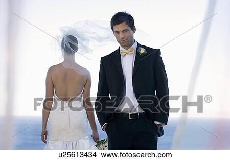 A groom regretting his marriage View Large Photo Image Picture - A groom regretting his marriage. Fotosearch