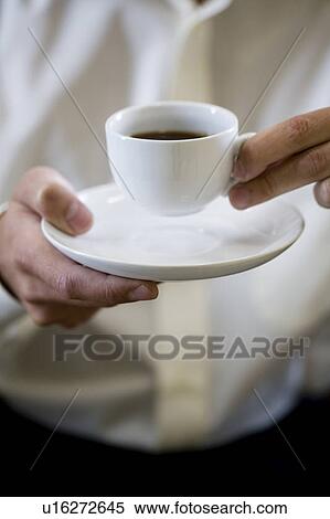 Close up of a man with an espresso cup View Large Photo Image Stock Photography - Close up of a man with an espresso cup . Fotosearch