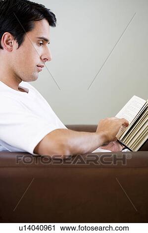 Portrait of a man reading View Large Photo Image Stock Image - Portrait of a man reading. Fotosearch