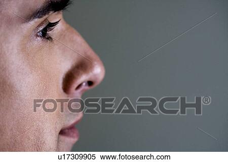 Portrait of a young man looking pensive, side profile View Large Photo Image Stock Photography - Portrait of a young man looking pensive, side profile. Fotosearch
