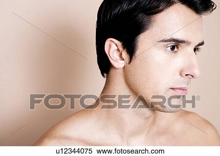 Portrait of a young man View Large Photo Image Stock Photography - Portrait of a young man . Fotosearch