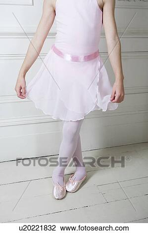 Stock Image - Close up of a girl in a ballet tutu. Fotosearch