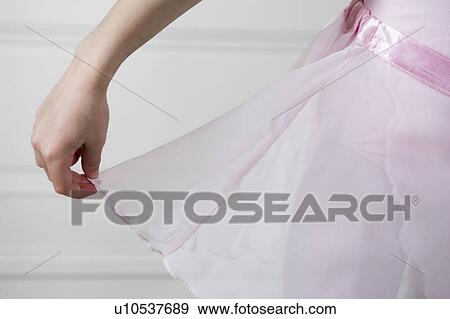 Stock Photo - Close up of a girl in a ballet tutu. Fotosearch