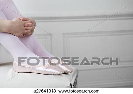 Close up of a young girls feet wearing ballet shoes View Large Photo Image Stock Photo - Close up of a young girls feet wearing ballet shoes. Fotosearch