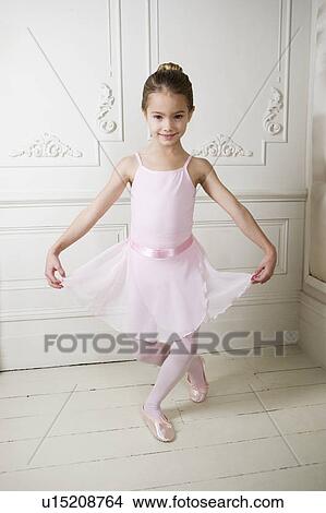 Picture - Little girl in a ballet pose . Fotosearch