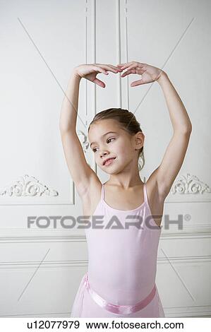 Stock Photo - Little girl in a ballet pose . Fotosearch