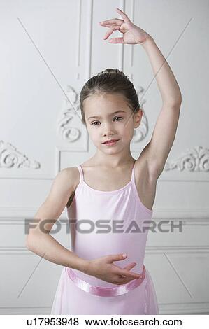 Little girl in a ballet pose View Large Photo Image Stock Photo - Little girl in a ballet pose . Fotosearch
