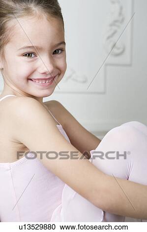 Portrait of a smiling girl in a ballet tutu View Large Photo Image Stock Image - Portrait of a smiling girl in a ballet tutu. Fotosearch