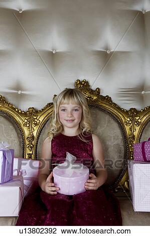Little girl with birthday presents View Large Photo Image Stock Image - Little girl with birthday presents . Fotosearch